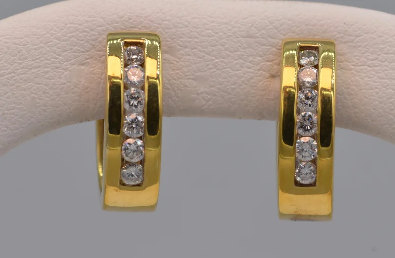 Ladies Earrings Light Spark-14K yellow gold hoop earrings with diamonds