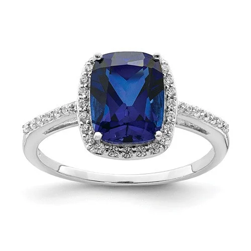 Ladies Rings with Rust Brookite-Sterling Silver Cushion Cut Lab-Created Blue Sapphire & CZ Halo Ring