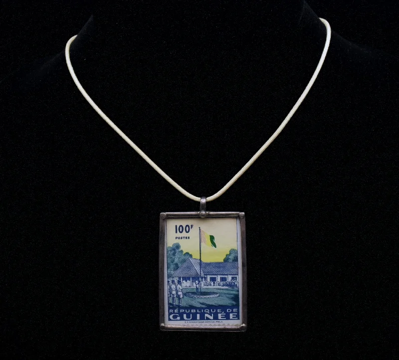 Ladies playful acrylic necklaces -Vintage République de Guinée Stamp Sterling Silver Pendant Necklace