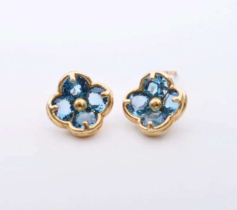 Ladies Earrings with Pure Okenite-14K yellow gold flower-shaped post earrings with Blue Topaz