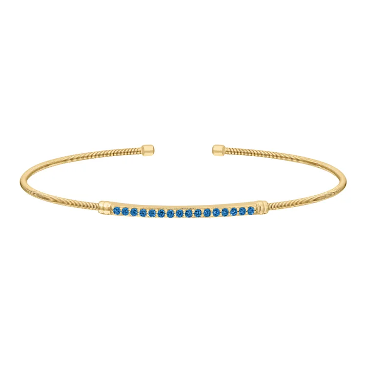 Harmonious blend bracelets -Gold Finish Sterling Silver Cable Cuff Bracelet with Simulated Blue Zircon Birth Gems - December