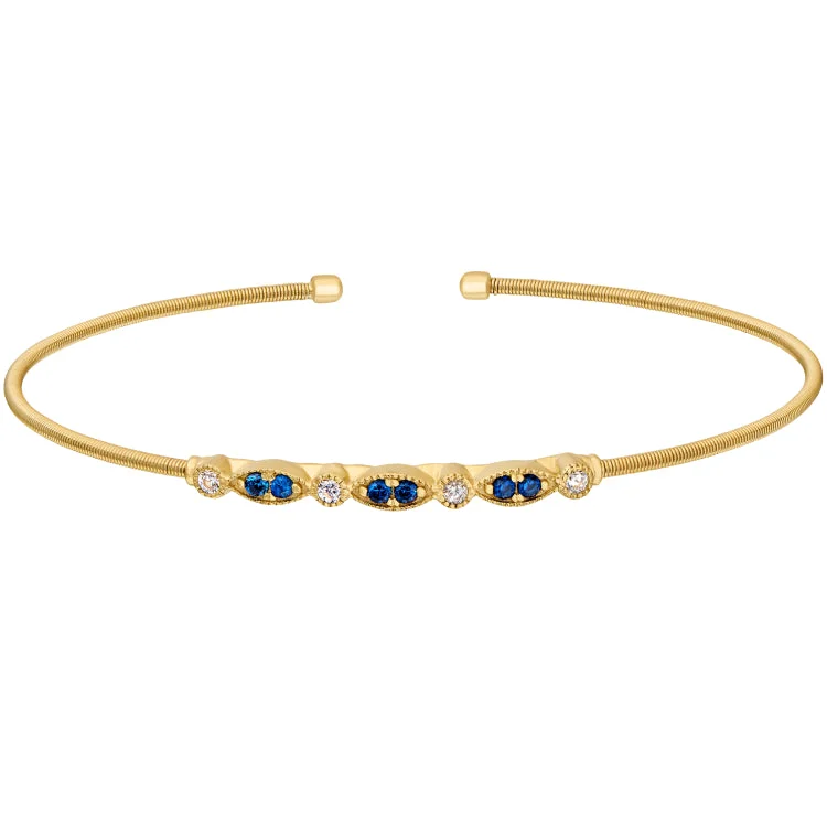 Subtle grace bracelets -Gold Finish Sterling Silver Cable Cuff Bracelet with Simulated Blue Sapphire and Simulated Diamond Marquis & Round Design