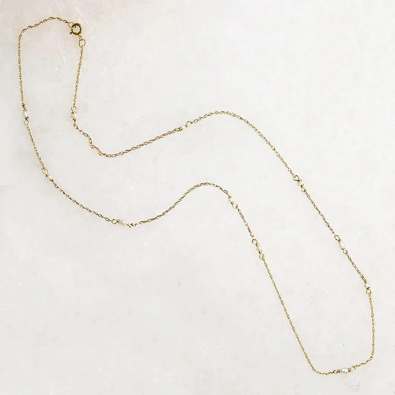 Ladies exotic eastern necklaces -Tiny Pearl Stations Gold Necklace by brunet