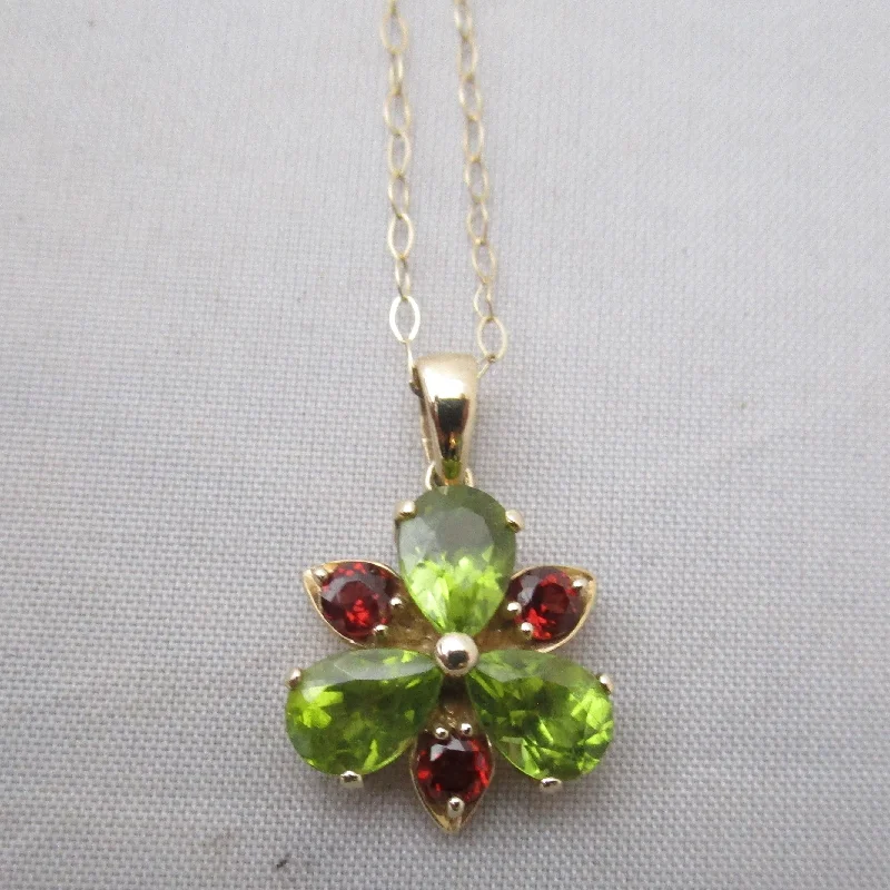 Ladies slim silhouette necklaces -9k Gold Peridot And Garnet Flower Pendant Necklace Vintage c1980