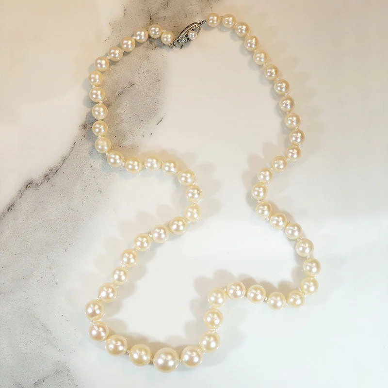 Ladies tactile texture necklaces -Princess Length Graduated Pearl Necklace with Silver Clasp