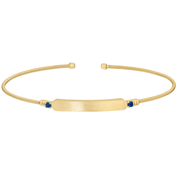 Courageous heart bracelets -Gold Finish Sterling Silver Cable Cuff Bracelet with Name Plate and Simulated Blue Sapphire Birth Gems - September