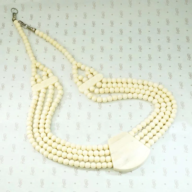 Ladies soulful essence necklaces -Subtle & Sophisticated Carved Bone Bead Necklace