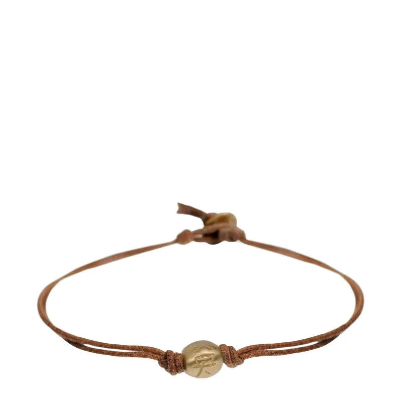 Exotic eastern bracelets -10K Gold Courage Bead Bracelet on Natural Cord