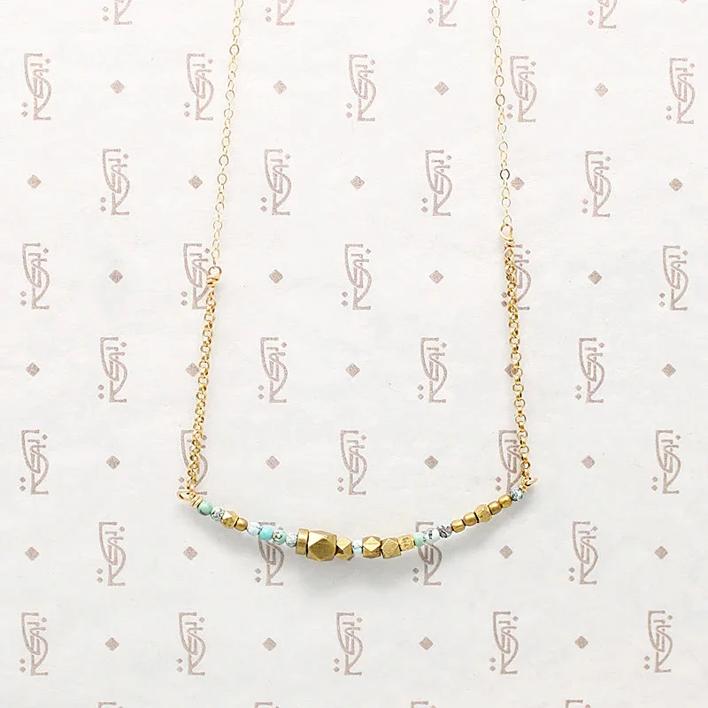 Ladies opulent gold necklaces -Turquoise & Brass Bead Arc Necklace by Brin