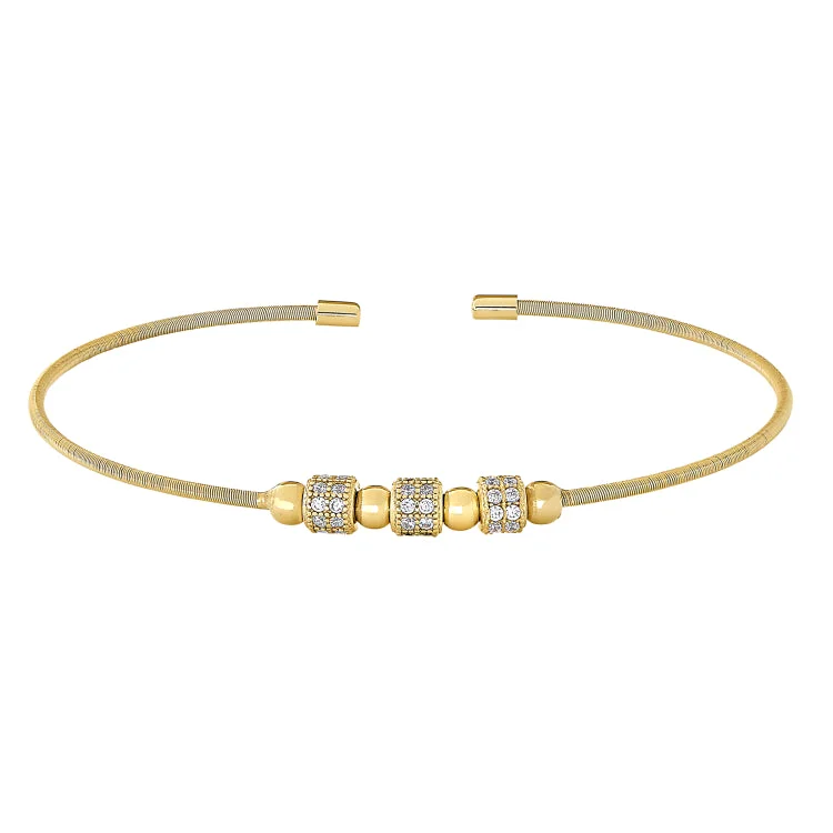 Fanciful twist bracelets -Gold Finish Sterling Silver Cable Cuff Bracelet with Three Spinning Simulated Diamond Beads